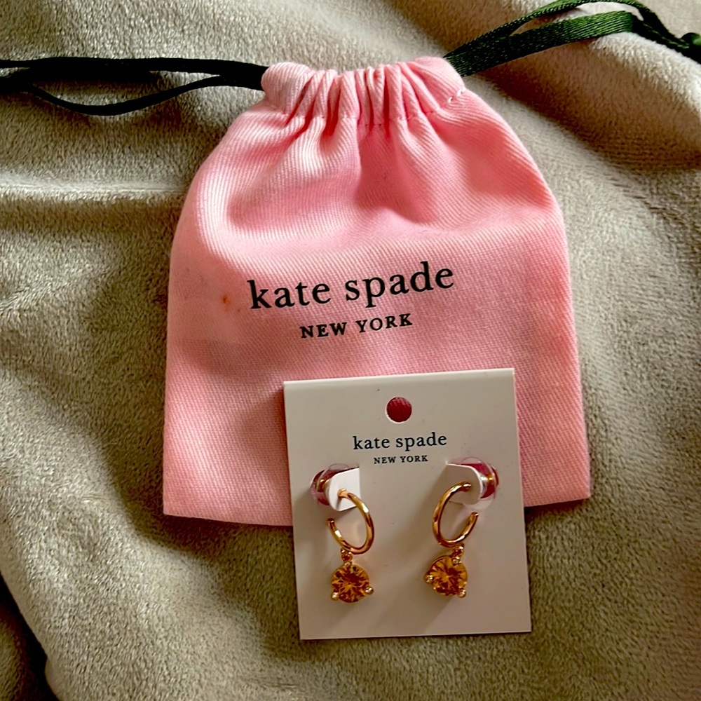 Kate Spade Rise and Shine earrings. New never worn. Gold and rose colored gem.